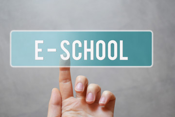 E-school - finger pressing blue transparent button on virtual touchscreen interface on gray background with copy space for text. E-learning and online education concept. 