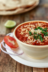 Butter Chicken served in a creme color bowl