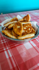 Pies in stainless steel cup. Pies on the table.