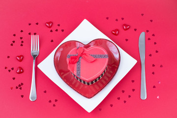 gift in box, heart shaped plate and cutlery 
