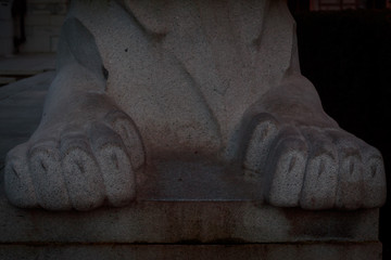 Paws of a stone lion