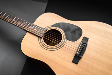 Obraz na płótnie Canvas acoustic guitar on black background