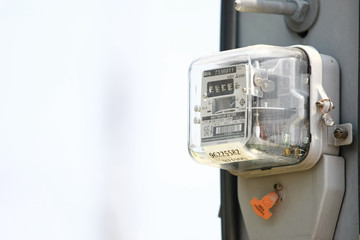 Electricity meter on the electricity post in the village , on 2020 March 14 , Bangkok Thailand