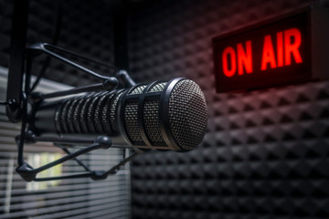 Professional microphone in radio station studio on air - obrazy, fototapety, plakaty