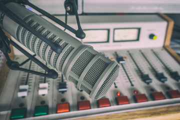 Professional microphone and sound mixer in radio station studio