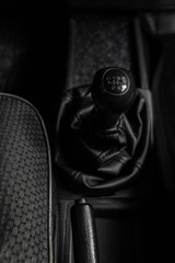 gearsift of a sportive car modern, metal, handle, inside, accelerate, engine, concept, circle, truck, interior, travel, change, power, vehicle, matte, automobile, shifting, new, ready, black, detail