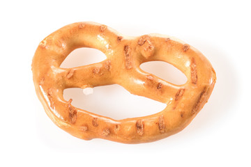 Pretzel, mini snack with salt for beer. Savory backed beer snack. Macro close-up isolated on white background