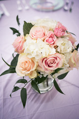 Wedding bouquet on reception table