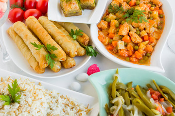 Setting table (Bayram sofrasi) with traditional Turkish foods for Sugar Feast after Ramadan Eve or Feast of Sacrifices. 	