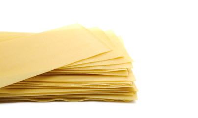 Uncooked Italian lasagna, pasta isolated on white background