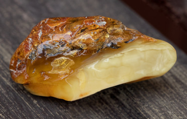 Natural amber. A piece of yellow opaque natural amber 