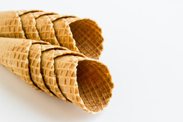 Crispy,Conical Cornets of Ice Cream on the white surface with copy space.