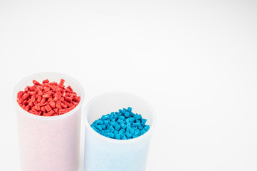 Plastic granules close up for holding,Colorful plastic granules with white background. and dollar money,Plastic Business,Plastic industry.