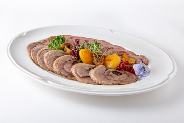 Sliced meat delicacies. Delicious beef, pork and poultry. Banquet festive dishes. Gourmet restaurant menu. White background.