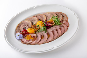 Sliced meat delicacies. Delicious beef, pork and poultry. Banquet festive dishes. Gourmet restaurant menu. White background.