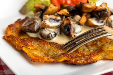 swiss roesti with mushroom sauce