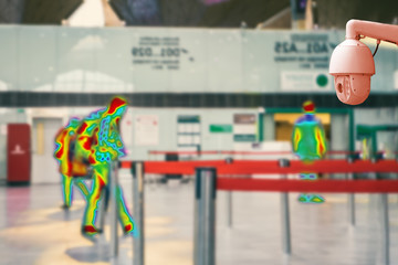 Fototapeta na wymiar A man walks through the airport, waiting for the plane to take off. Blurred. Concept of video surveillance and security during quarantine
