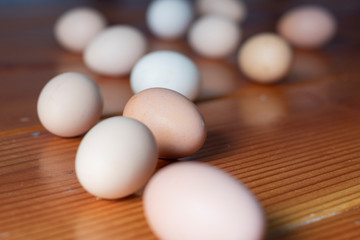 Eggs Spread Out on a Wooden Table