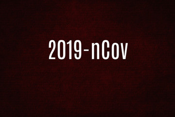 Deadly pandemic virus on global scale - coronavirus, 2019-ncov or covid-19. Concept and red background with word.