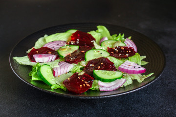 healthy salad beetroot slices, iceberg lettuce, greens. Menu concept food background, keto or paleo diet. top view. copy space for text