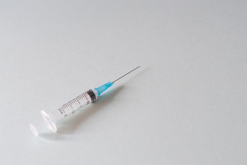 syringe on a light background for your design