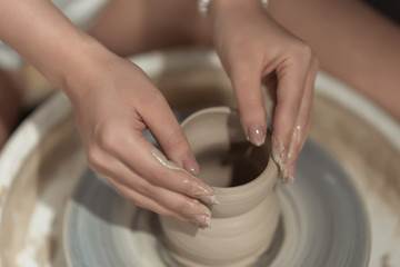 hands on a Potter 's wheel for your layout