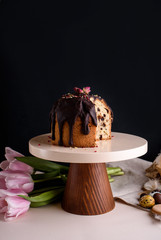 Delicious and very beautiful Easter cake with chocolate and nuts on a beautiful stand.