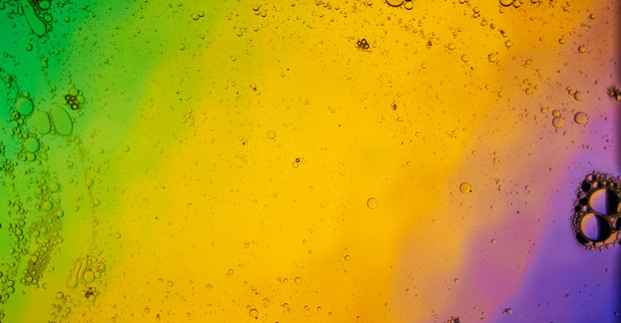 Oil On Water Colourful Yellow And pink Bubbles © herme