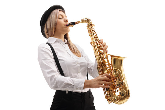 Young female musician playing a saxophone