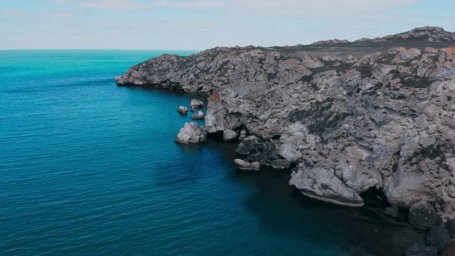 Flight near the rocks in the Crimea near the sea