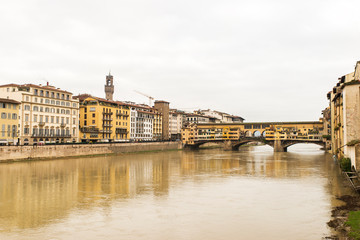 Fototapeta na wymiar Beautiful Sights of Ponte Vecchio Bridge and Arno River in Florence, Italy.