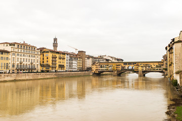 Fototapeta premium Beautiful Sights of Ponte Vecchio Bridge and Arno River in Florence, Italy.