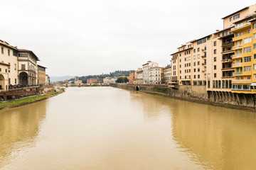 Fototapeta na wymiar Beautiful Sights of Ponte Vecchio Bridge and Arno River in Florence, Italy.