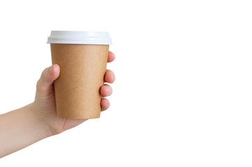 Paper brown cup of coffee in the hand of caucasian girl. White isolate.