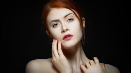 portrait of a young woman with red hair