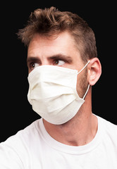 male wearing surgical face mask