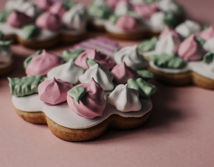 Cookies in a form of flowers. Spring concept. Candy bar. Birthday. Wedding. Pink background.