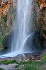 Fototapeta na wymiar a small waterfall in the forest