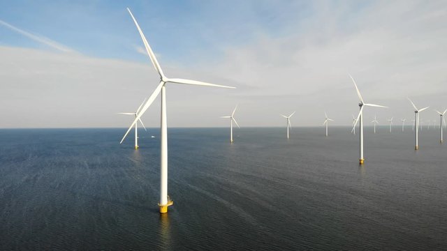 Wind turbine from aerial view, Drone view at windpark westermeerdijk a windmill farm in the lake IJsselmeer the biggest in the Netherlands,Sustainable development, renewable energy