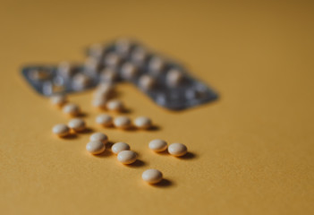 Medicine pills or capsules. Pharmaceutical medicament. Antibiotic, painkiller closeup. Medical flat lay.