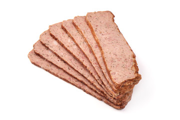 Sliced homemade turkey meatloaf, isolated on white background