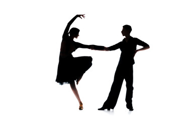silhouettes of elegant couple of ballroom dancers dancing isolated on white