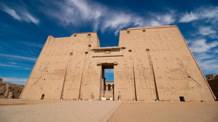 Naklejka premium Edfu is the site of the Ptolemaic Temple of Horus and an ancient settlement. Egypt. Edfu also spelt Idfu, and known in antiquity as Behdet.