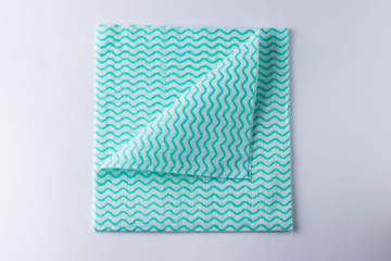Folded napkin with curved corner