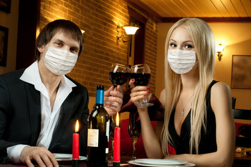couple on romantic evening date in restaurant