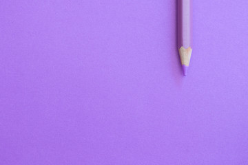 Purple pencil and paper useful for a presentation background.