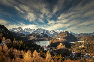 Alps mountains in germany near the Hohenschwangau lake, castle and town. View from Neuschwanstein...