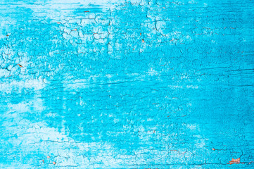 Fototapeta na wymiar Вlue wooden background. Board with the texture of the old cracked paint