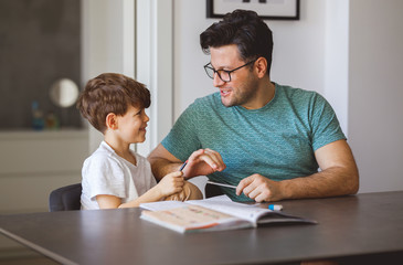 Having Fun While Doing Homework With My Dad