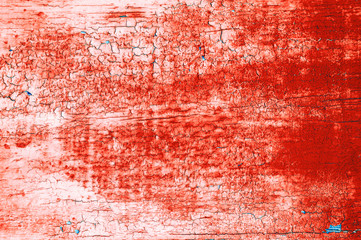 Red wooden background. Texture of old cracked paint